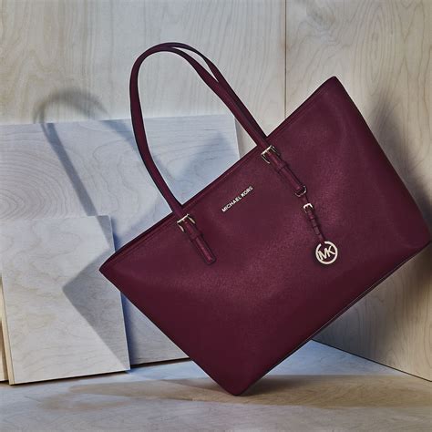 torebka michael kors srebrny ppasek|Michael Kors tote bags.